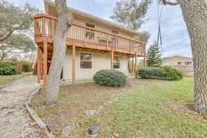 Stroll through the beautifully manicured lawn to the entrance of this charming home.