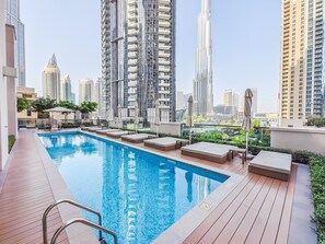 Outdoor pool - The Elevated Abode 1BHK Apt in Downtown (Dubai)
