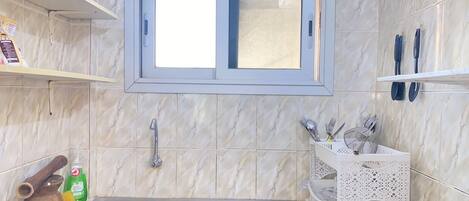 Hair dryer, towels, shampoo