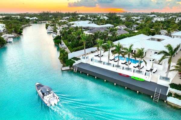 A brand-new villa offering the ultimate luxurious, carefree canal-side getaway.