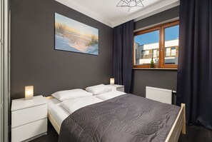 アパートメント 2 ベッドルーム バルコニー 海側 | 2 室のベッドルーム、ベッドシーツ