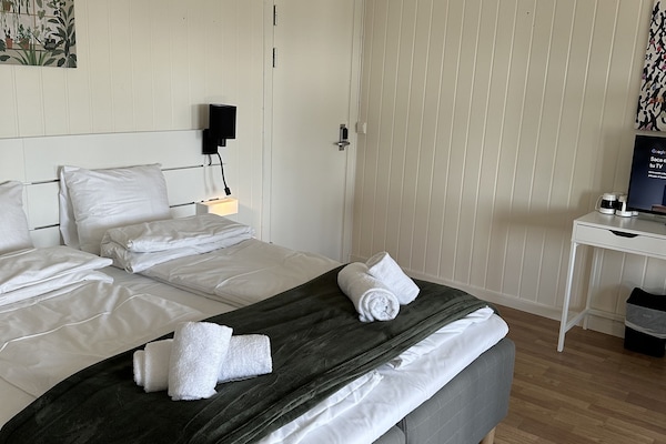 Classic Quadruple Room | Desk, laptop workspace, cribs/infant beds, free WiFi