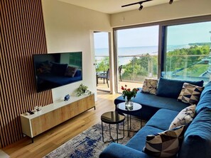 Flat-screen TV - Modern apartment with a beautiful sea view. (Darłowo)