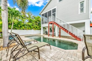 A heated pool - Anna Maria Island Rental with Saltwater Pool and Elevator - Steps to Beach! (Holmes Beach)