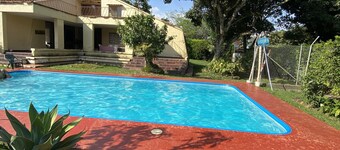 Comfortable and stylish Country Casita with a creek and a pool and lots of trees