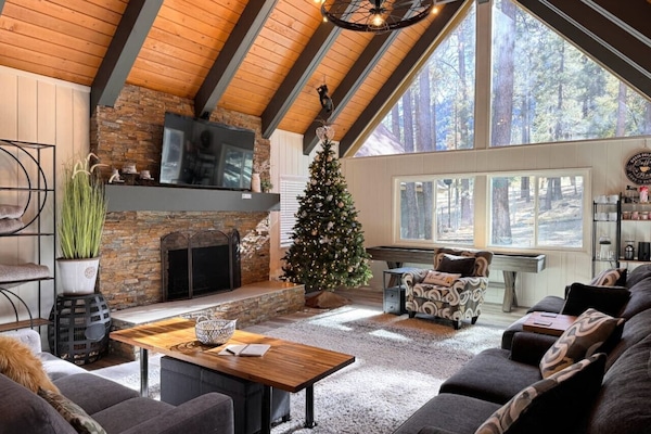 Welcome to Knotty by Nature: Where rustic charm meets modern comfort in your perfect mountain retreat.