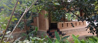 A tranquil, riverside earthen home for a comfortable and peaceful stay