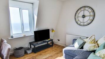 Apartment | Living area | 50-inch Smart TV with digital channels