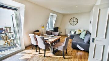 Apartment | Living area | 50-inch Smart TV with digital channels