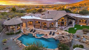 A large estate with a swimming pool, multiple buildings, and a view of the surrounding landscape. - Scottsdale Diamond Mtn Oasis+Waterslide+Pickleball (Scottsdale)