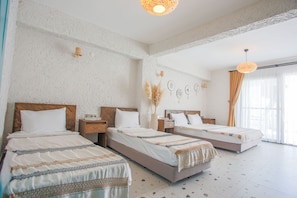 Superior Quadruple Room | Premium bedding, in-room safe, desk, laptop workspace - Glenn Hotel & Beach (Ayvacik)