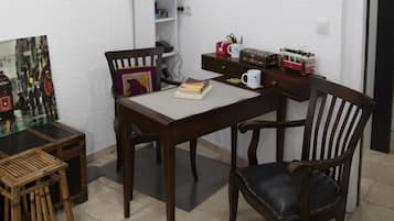 Basic Double Room | Living area | Flat-screen TV