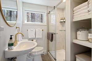 Shower, hair dryer, towels, soap