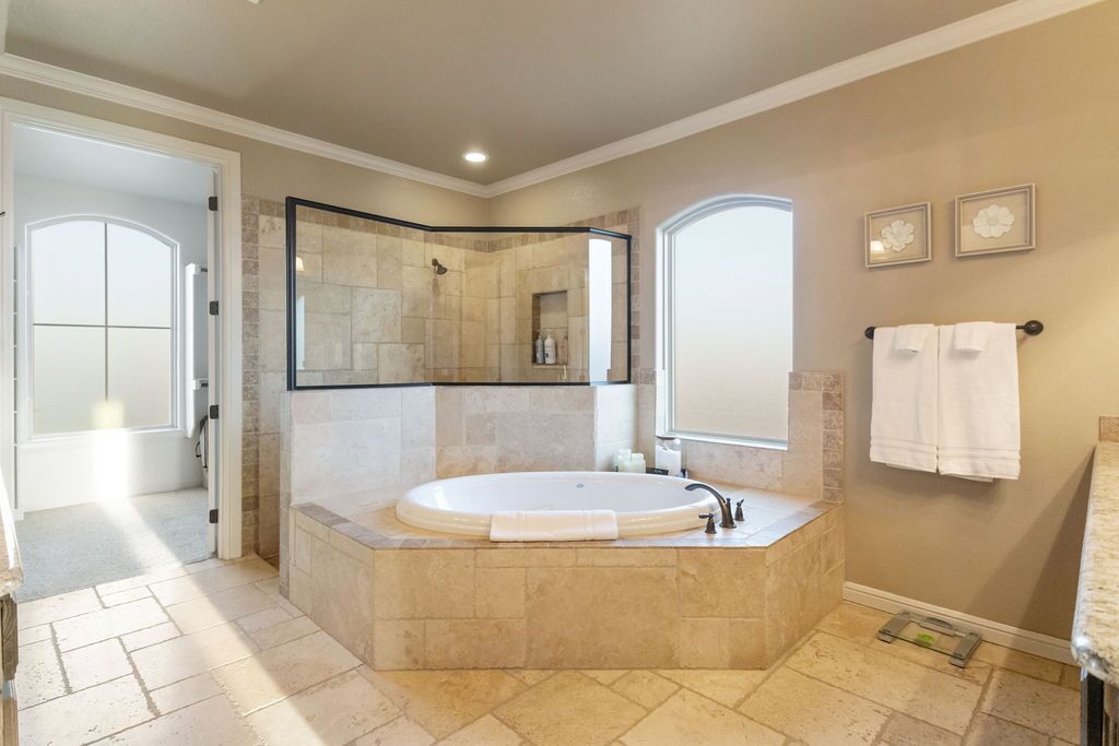 Jetted tub, hair dryer, towels, soap