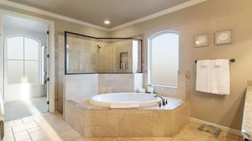 Jetted tub, hair dryer, towels, soap