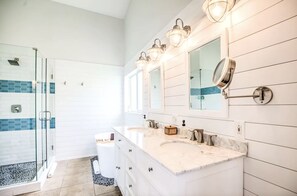 Shower, eco-friendly toiletries, hair dryer, towels