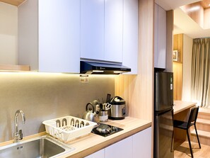 Studio | Private kitchen | Full-size fridge, stovetop - Good And Cozy Studio At Pollux Chadstone Apartment (Cikarang)