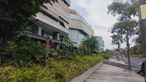 A residential area with a sign indicating 'IN RESIDENTIAL' and a direction to 'HALL A'. - Good Choice And Homey 1Br Grand Sungkono Lagoon Apartment (Surabaya)
