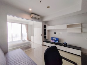 Apartment | Living area - Nice And Comfy 1Br At Dago Suites Apartment (Bandung)