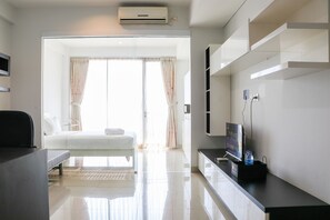 Living area - Nice And Comfy 1Br At Dago Suites Apartment (Bandung)