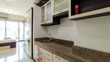 Studio | Private kitchen | Full-sized fridge, stovetop