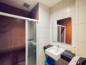 Apartment | Bathroom | Shower, free toiletries, towels - Tranquil Designed 2Br Apartment Dago Suites (Bandung)