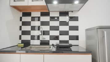 Departamento | Cocina privada | Refrigerador con congelador y parrilla de estufa