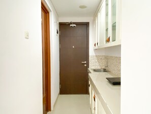 Studio | Private kitchen | Full-size fridge, stovetop - Good Choice And Homey Studio Enviro Apartment (Cikarang)