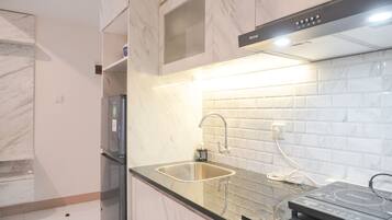 Apartment | Private kitchen | Full-size fridge, stovetop