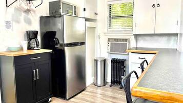 Fridge, microwave, coffee/tea maker, toaster