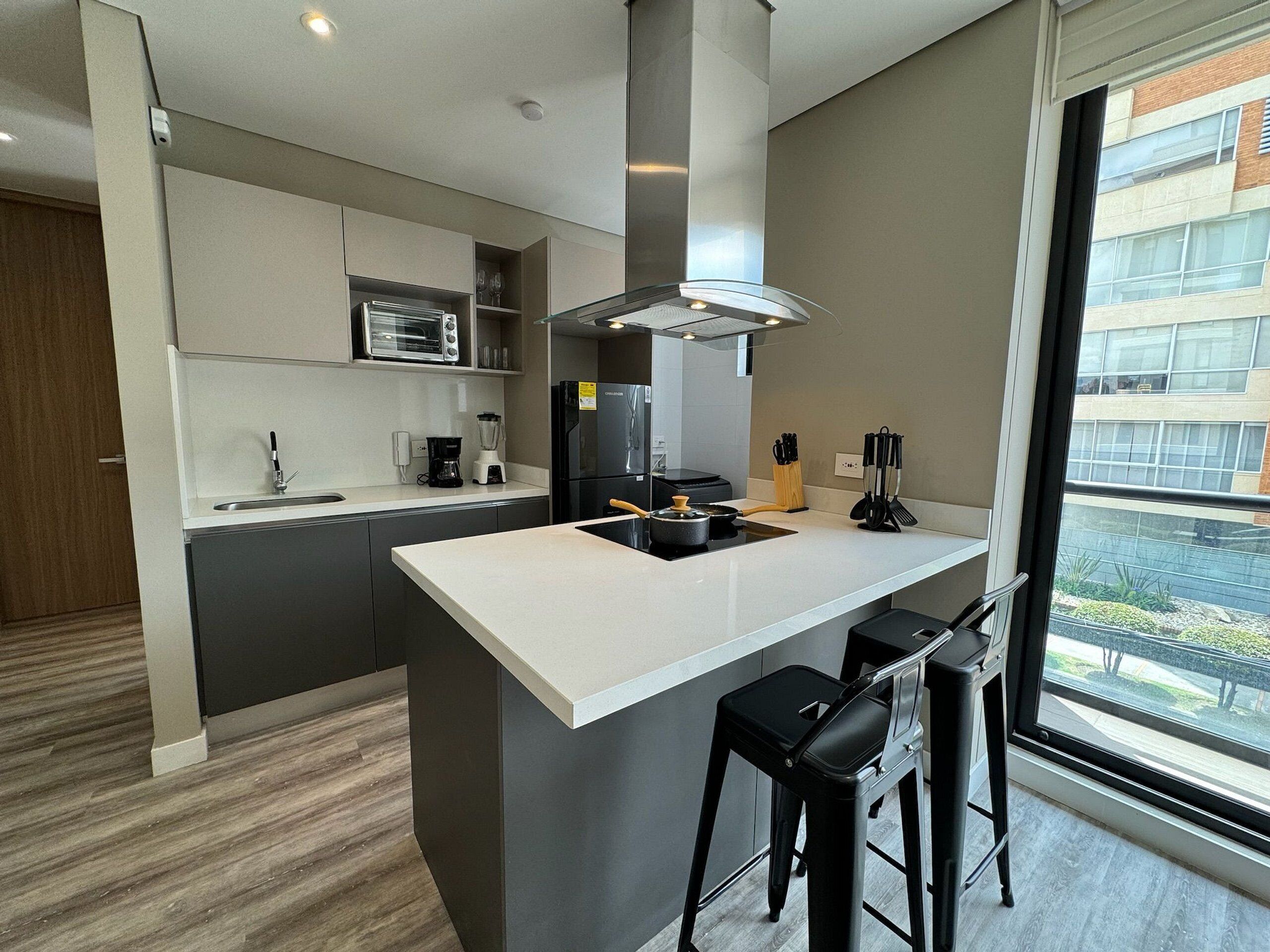 Family Apartment | Private kitchen | Fridge, microwave, coffee/tea maker, blender