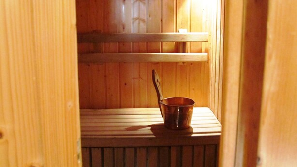 A wooden interior with a metal cup on a shelf. - Spacious Baugnez Cottage (Malmedy-Baugnez)