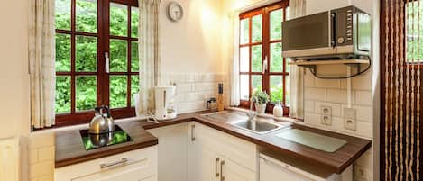 Fridge, microwave, coffee/tea maker, highchair