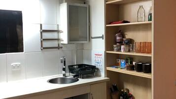 Fridge, microwave, stovetop, coffee/tea maker