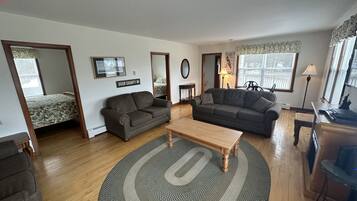 House | Living area | 32-inch LED TV with cable channels, DVD player