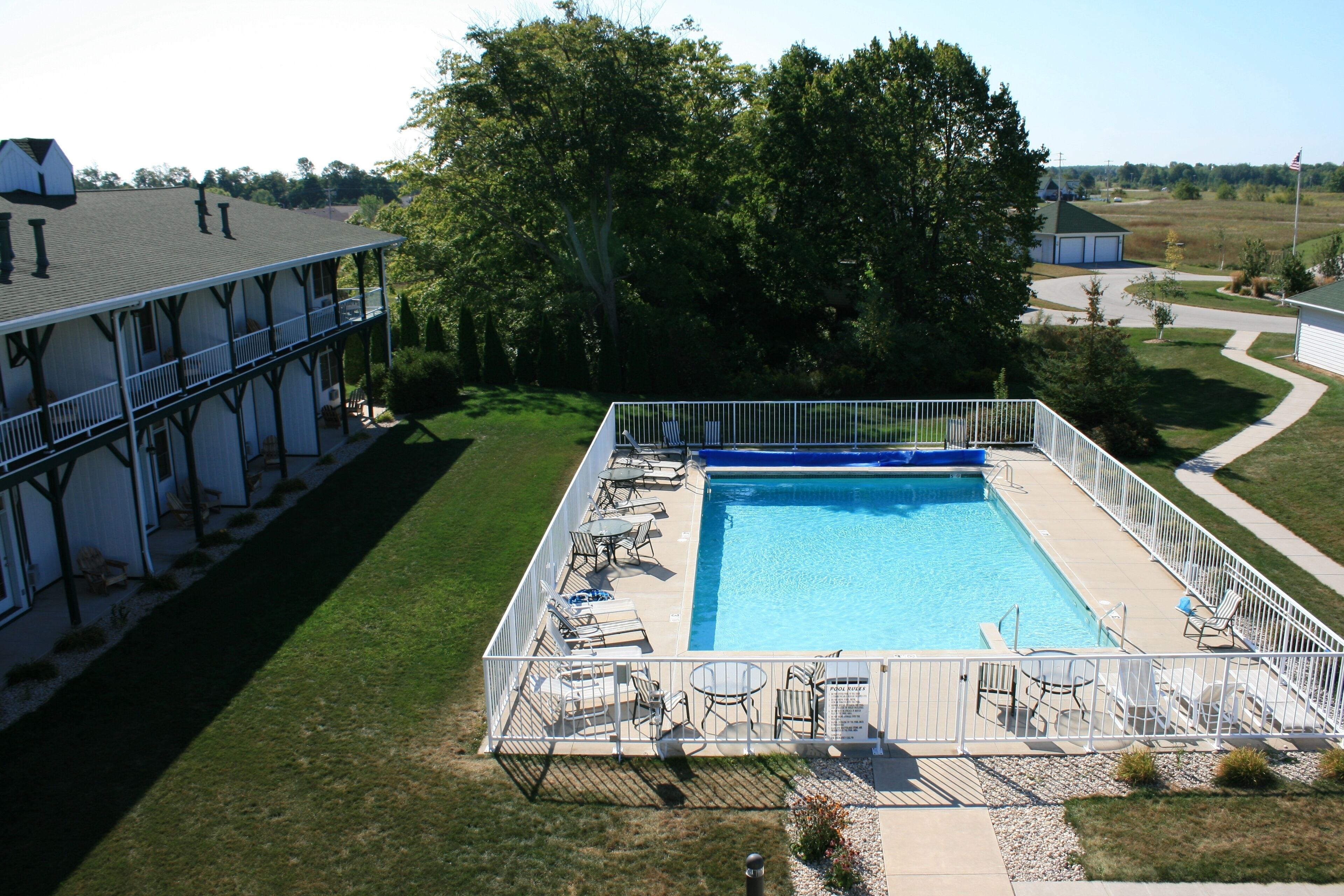 Indoor pool, seasonal outdoor pool, pool umbrellas, pool loungers