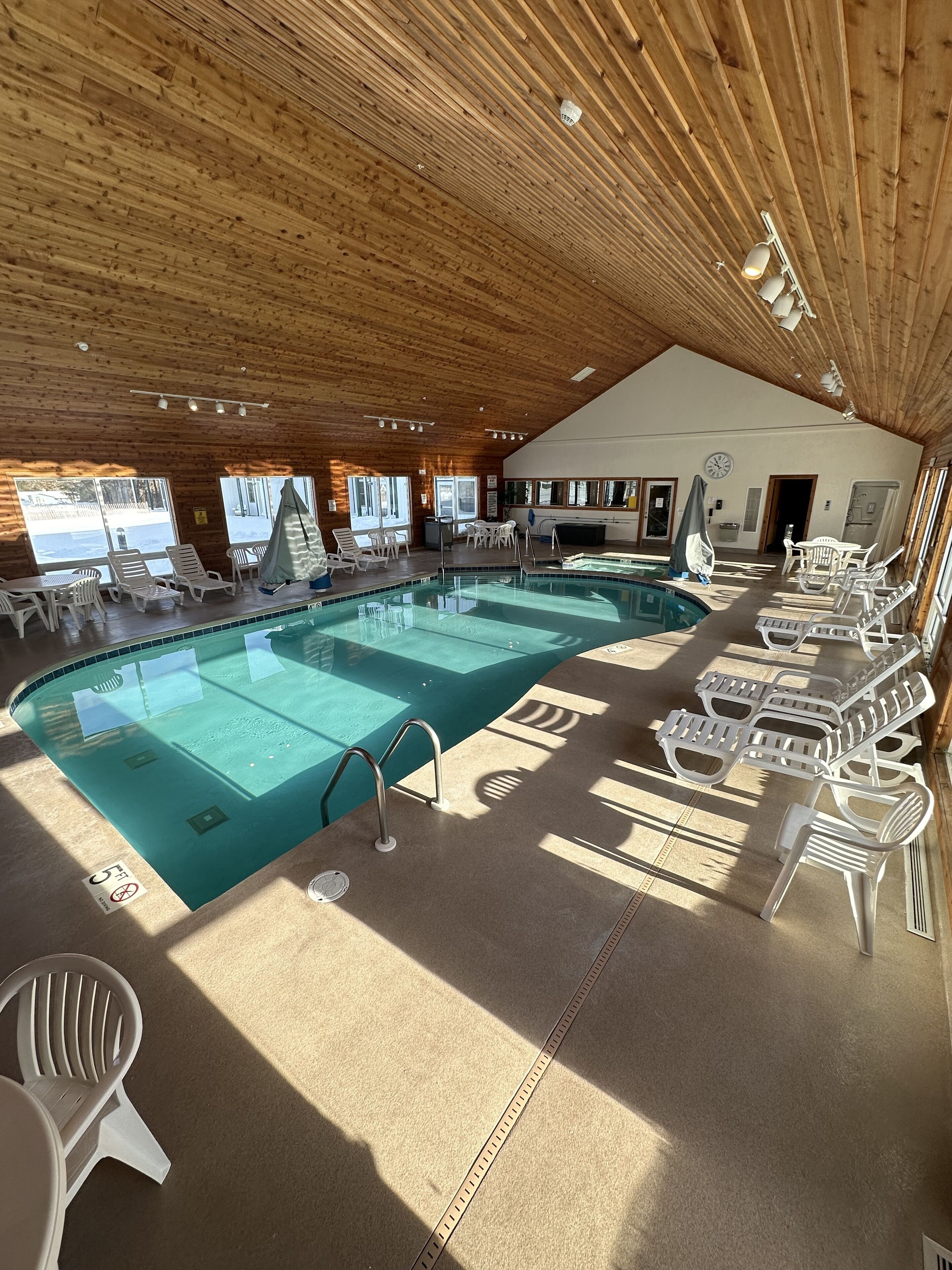 Indoor pool, seasonal outdoor pool, pool umbrellas, sun loungers
