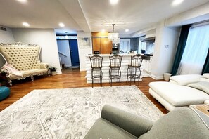 Smart TV, fireplace, books, printers