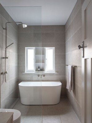 Shower, hair dryer, towels, soap