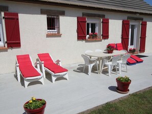 Relax in style with a comfortable lounge chair and a beautiful view.