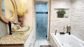 Shower, jetted tub, hair dryer, towels
