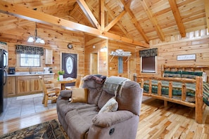 Living area - Over the hill and through the woods, to the Cozy Cub cabin we go.  (Logan)