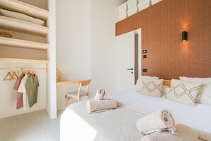 2 habitaciones, tabla de planchar con plancha y cuna de viaje