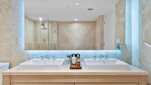 Shower, hair dryer, towels
