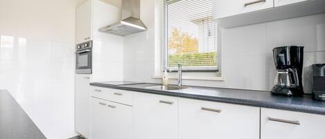 Fridge, microwave, dishwasher, coffee/tea maker