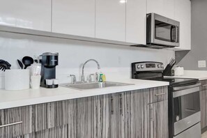 Fridge, microwave, stovetop, coffee/tea maker - Coastal Charm: Cozy 1BR Retreat near Pompano Beach (Pompano Beach)