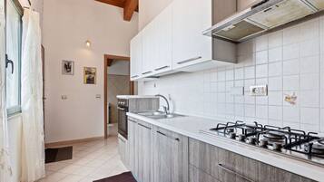 Microwave, oven, stovetop, dining tables