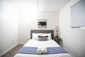 Laptop workspace, iron/ironing board, free WiFi, bed sheets - CozySuites The Block Skybridge Access (Indianapolis)