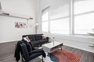 Apartment | Living area | 42-inch Smart TV with digital channels, Netflix, Hulu