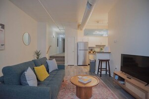 Apartment | Living area | 42-inch Smart TV with digital channels, Netflix, Hulu